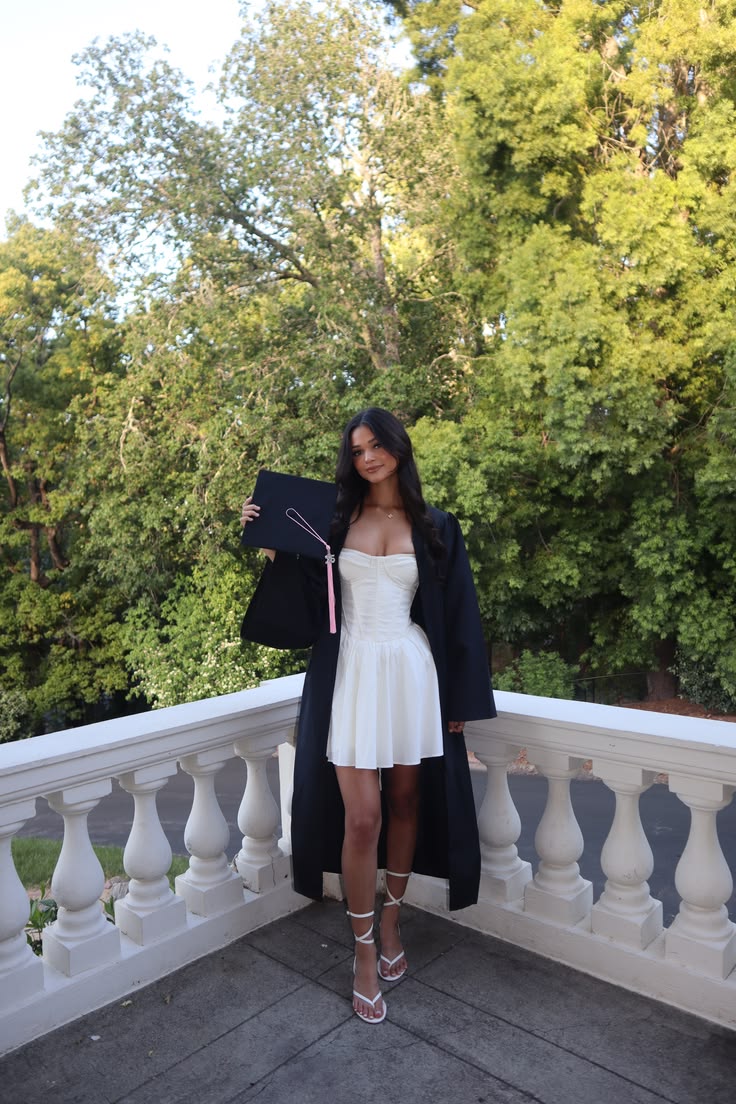 Women’s blazer styled with a white dress
